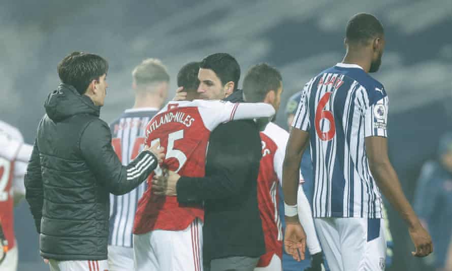 Mikel Arteta hugs Ainsley Maitland-Niles after Arsenal’s 4-0 win at the Hawthorns in January.