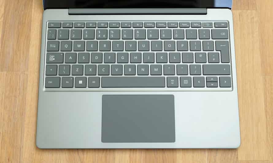 The keyboard deck and trackpad of the Surface Laptop Go 2.