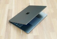 The Microsoft Surface Laptop Go 2 pictured half open on a table.