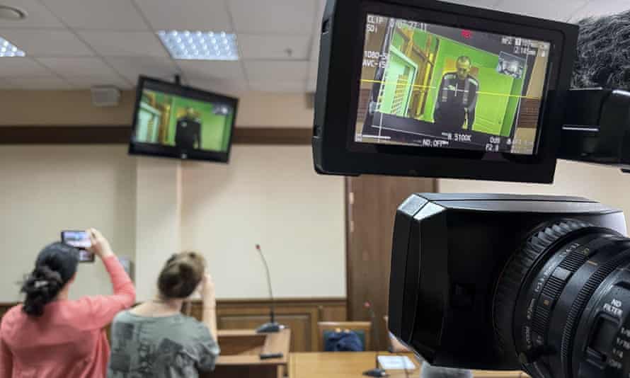 Russian opposition leader Alexei Navalny appears on a video link from prison provided by the Russian Federal Penitentiary Service in a courtroom in Vladimir, Russia.